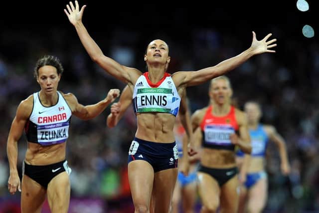 The moment her gold medal was confirmed as  Jessica Ennis wins the 800m. Photo: Martin Rickett/PA Wire.