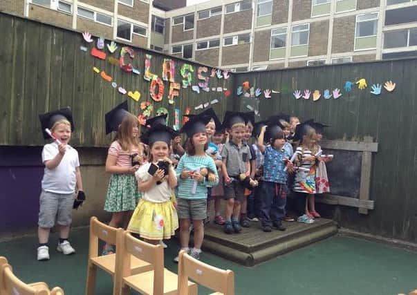 Youngsters attend the graduation ceremony at Bright Horizons Lynda Ellis Day Nursery and Preschool.