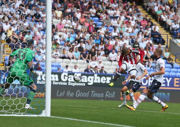 Leon Clarke misses with a header