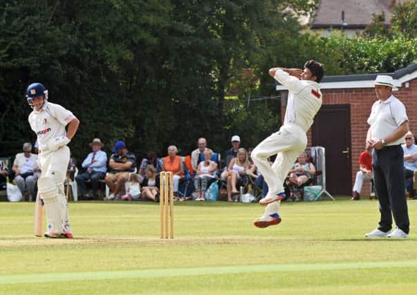 Tickhill's Jordan Lowe pictured batting and Shazad Rana pictured bowling for Elsecar. Picture: Marie Caley
