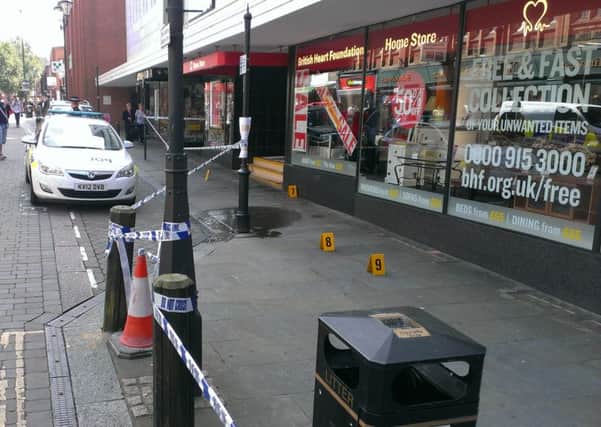 A scene of crime officer on Printing Office Street, Doncaster
