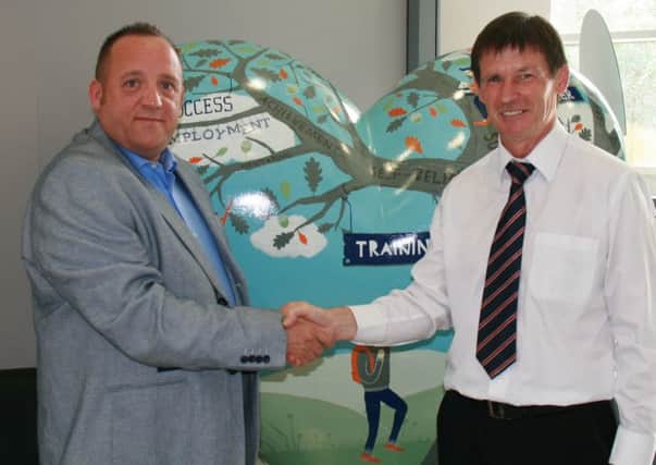 Dale Robinson, head of sales, marketing PR at The Source, left, with Richard Finney, marketing, communications and charity officer at Sheffield & Hallamshire County FA.