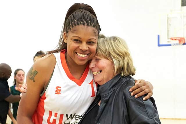 Founder Betty Codona and Hatters star Steph Gandy celebrate one of Hatters many successes.