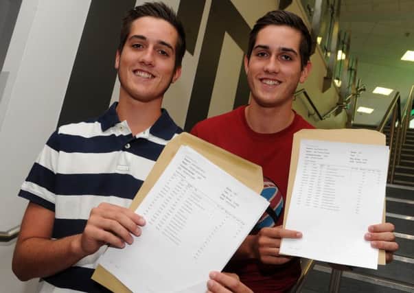 Bradfield AS level students and twins George (l) and Max Poulter celebrate on achieving an A at AS Level in Maths, Chemistry, Physics and Product Design. Picture: Andrew Roe