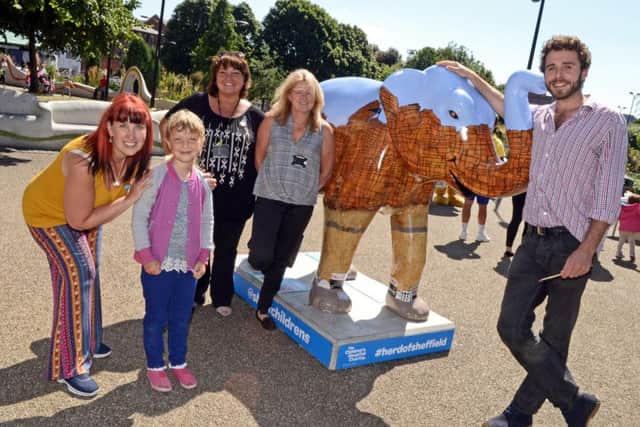 Annalise Moon, seven, of Sheffield, pictured with Sheffield Star stff members by their Elephant. Picture: Marie Caley NSST Star Elephant MC 8