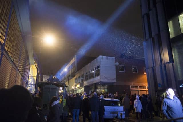 Searchlights sweep the sky at an event at the Moor Market last December to commemorate the 75th anniversary of the Sheffield Blitz