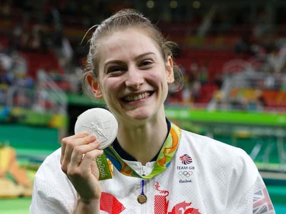 Bryony Page celebrates with her Olympic silver medal
