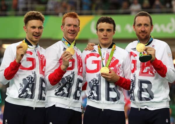 Left to right:  Owain Doull, Ed Clancy, Steven Burke and Sir Bradley Wiggins with their gold medals following victory in the men's team pursuit final. Photo: David Davies/PA Wire.