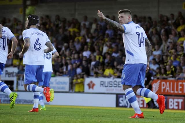 Gary Hooper celebrates scoring his first half penalty for Wednesday
