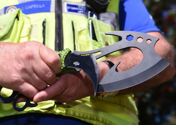Examples of 'zombie knives' which will be banned in the UK. Photo: Joe Giddens/PA Wire