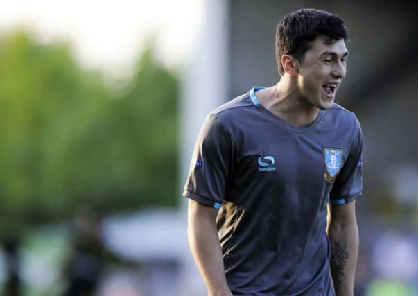Owls star Fernando Forestieri looked happy to be back in amongst his team-mates at Burton