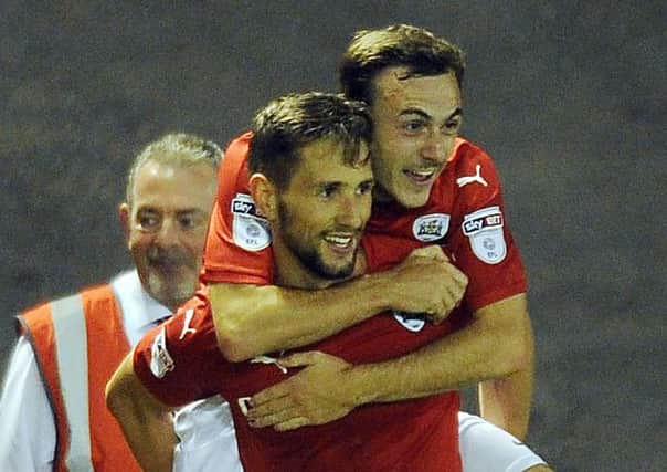 Conor Hourihane celebrates his equaliser against QPR with Josh Scowen.  Picture Tony Johnson