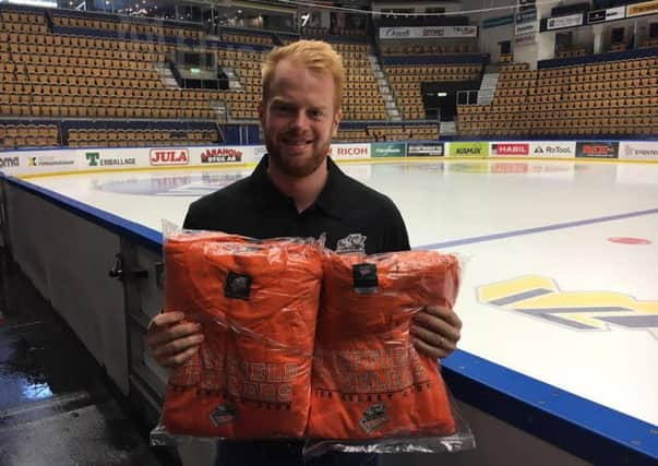 Markus Nilsson - with T-shirts for his Swedish friends and family