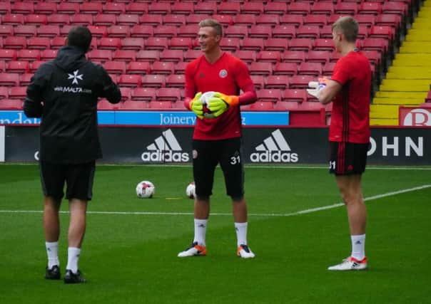 Simon Moore trains with United at Bramall Lane