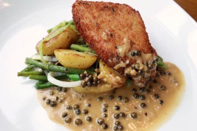 Food review at Crucible Corner in Sheffield. Panko & Herb Crumbed Gammonwith smoked leeks, sauteed potatoes, peas and green peppercorn sauce. Photo: Chris Etchells