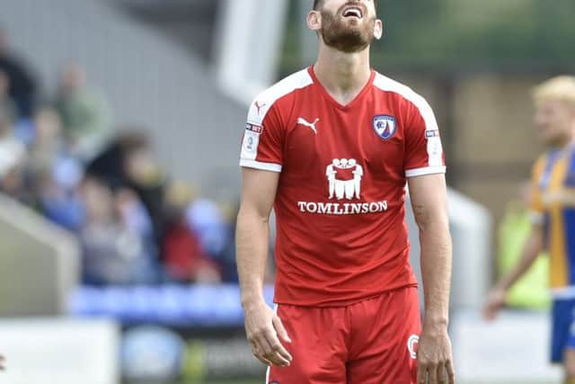 Chesterfield's Ched Evans reacts after his shot goes wide