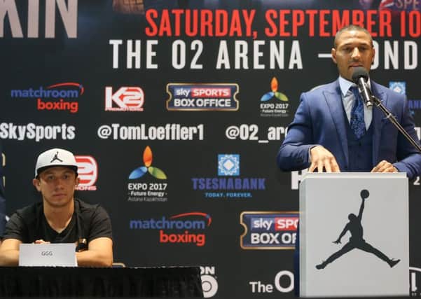 Kell Brook stands up to the challenge of Gennady Golovkin (left)