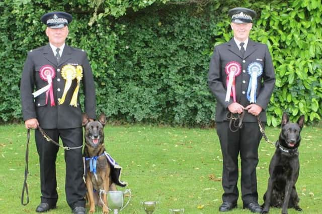 PC Steve Gill and Rocky and PC Adrian Noble and Evo