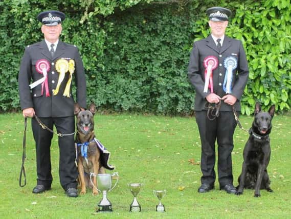 PC Steve Gill and Rocky and PC Adrian Noble and Evo