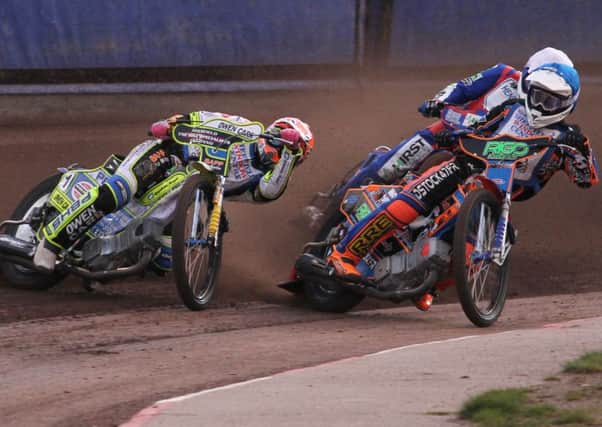 Simon Stead leads Dimitri Berge and Josh Auty against Scunthorpe earlier this year. Photo: Andy Garner