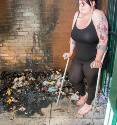 Stacey Slack from High Green who has been lft without hot water and heating after the seventh bin fire at her flats