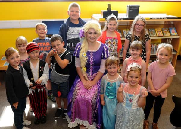 Bryony Clarke, dressed as Rapunzel, at a pirates and princesses event at Mexborough Library. Picture: Andrew Roe