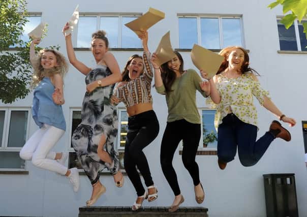 Students of Handsworth Grange Community Sports College celebrate receiving their GCSE Results. Picture: Andrew Roe