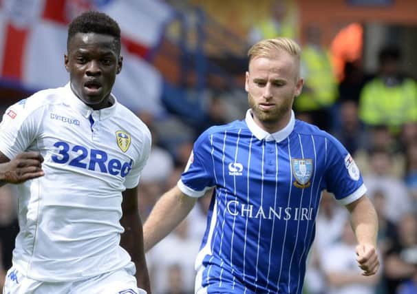 Ronaldo Viera go's clear of Barry Bannan.
Sheffield Wednesday v Leeds United. Skybet Championship.  Hillsborough. 20 August 2016.  Picture Bruce Rollinson