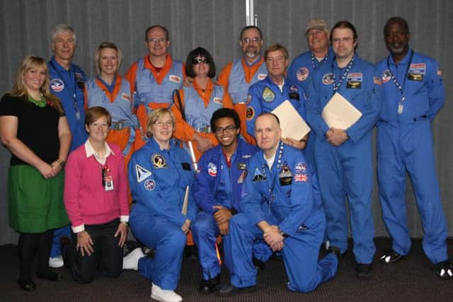 Phil Reeder, front row right, with staff from the US Space and Rocket Centres Space Camp training facility.