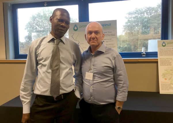 Sheffield residents gathered to have their say on flooding. Pictured Dr Godwin Ekebuisi, left, James Fletcher. Photo by Alice Lancaster.