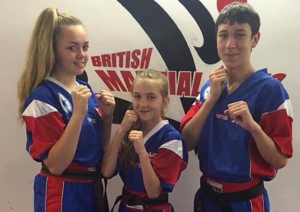 Young kickboxing stars Frankie Ashton, Freya Holmes and David Finlay