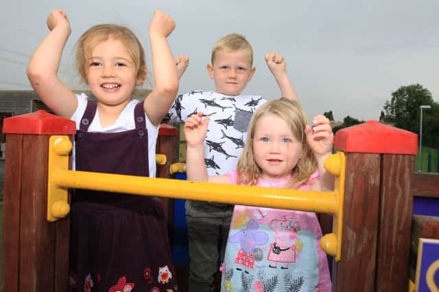 Open day at Bizzy Bee Family Childcare Centre in Beighton after the centre was destroyed by fire and is now reopen. Pictured are Isabelle Clark, four, Josh Spacey, seven, and Isla Thompson, two.