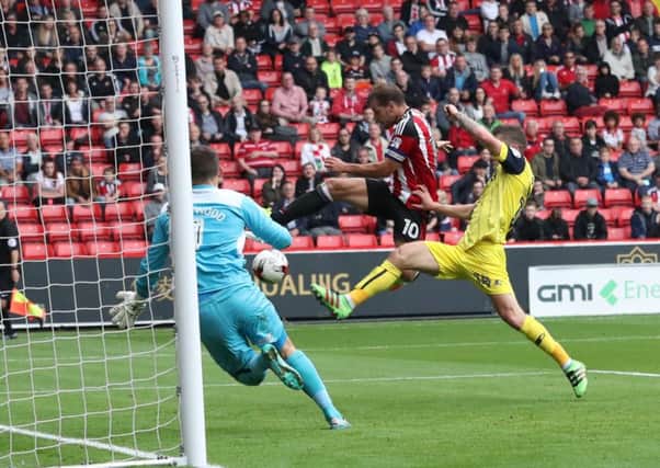 Billy Sharp of Sheffield United scoring his teams first goal of the game