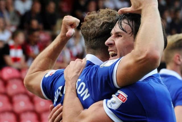 Sam Hutchinson (left) knew how to celebrate