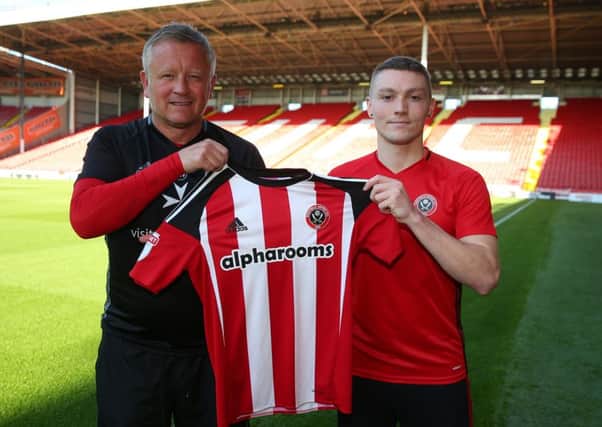 Chris Wilder manager of Sheffield Utd welcomes new signing Caolan Lavery
