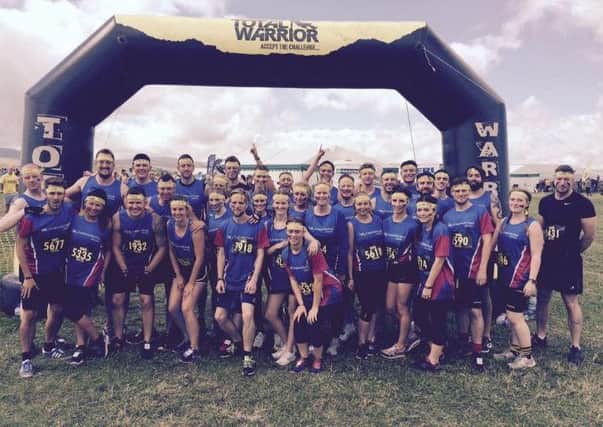 Members of staff from Irwin Mitchell at the Total Warrior challenge.