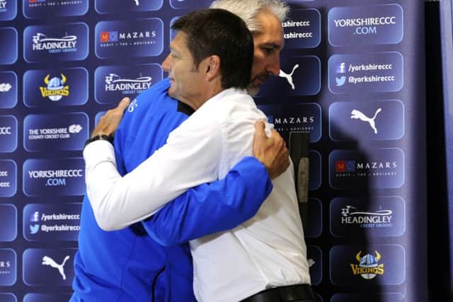 Head Coach Jason Gillespie is to leave at the End of the season. He is pictured here hugging Director of Cricket at Yorkshire County Cricket Club Martyn Moxon, at the  end of the press Conference. Picture by Simon Hulme