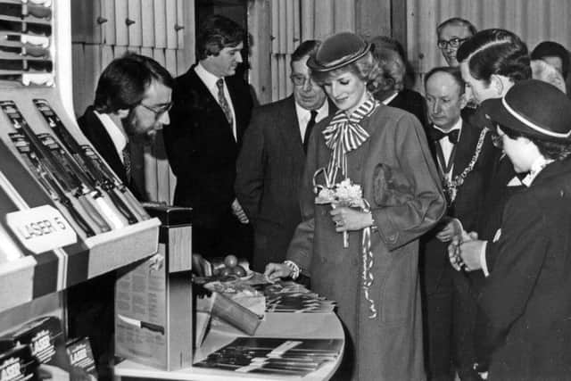 Diana visits a factory in Sheffield in 1984.