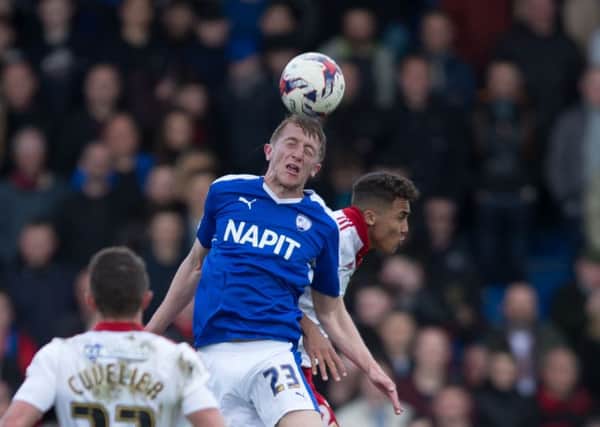 Chesterfield vs Sheffield United - Tom Anderson heads the ball  - Pic By James Williamson