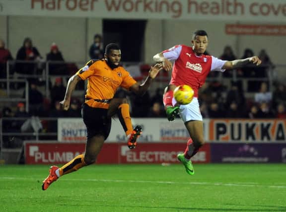 Rotherham United v Wolves ..Jonson Clarke-Harris is challenged by Ethan Ebanks-Landell..5th December 2015 ..Picture by Simon Hulme