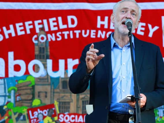 Jeremy Corbyn takes to the steps of Sheffield City Hall during a rally at Barker's Pool. Photo: The Star/Chris Etchells
