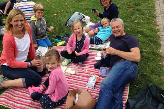 Cheryl Taberner, 44, James Watts, 50, with twin daughters Annabelle and Lily, 4, enjoy fair with family friend Rebecca Smith, 44, with sons Fraser, 8, and Finley, 6