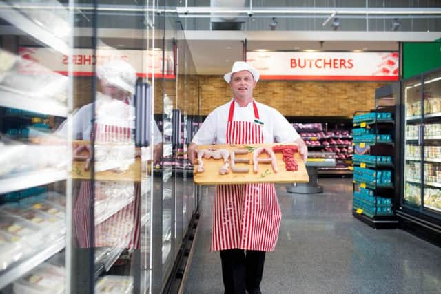 Butcher Gary Thompson helps Morrisons to announce their latest 'Price Crunch', a 12% reduction on their meat and poultry products this autumn, which aims to help families eat meat more affordably following research that shows households are eating more roasts mid-week. PRESS ASSOCIATION Photo. Issue date: Sunday September 4, 2016. The price crunch will be across 130 top selling cooked meat, fresh meat and poultry products alongside more than 30 fruit and vegetable lines. Photo:  David Parry/PA Wire