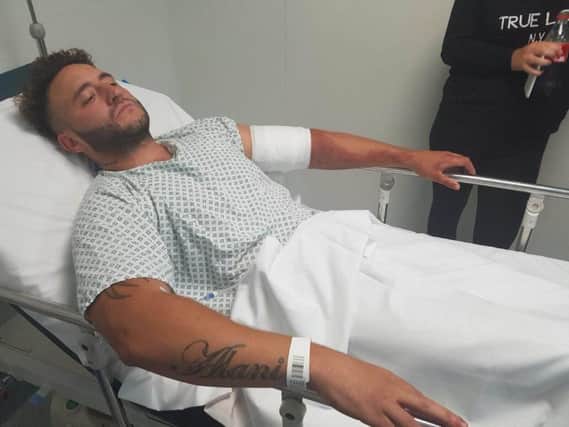 Luke Smedley in hospital following the attack