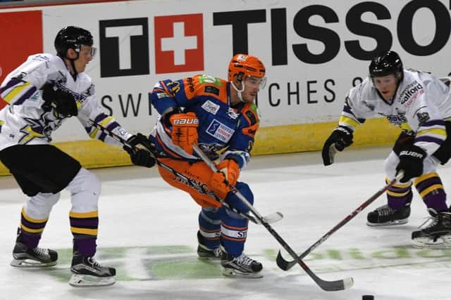 Sheffield Steelers Andreas Valdix weaves in between the Manchester Storm defence. Picture: Andrew Roe