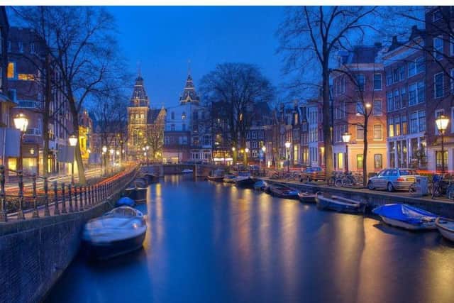 Canals: Amsterdam's watery web, beautiful by night or day