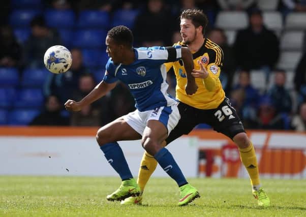 Dominic Poleon and Kieran Freeman could be set to renew their rivalry when Sheffield United visit AFC Wimbledon