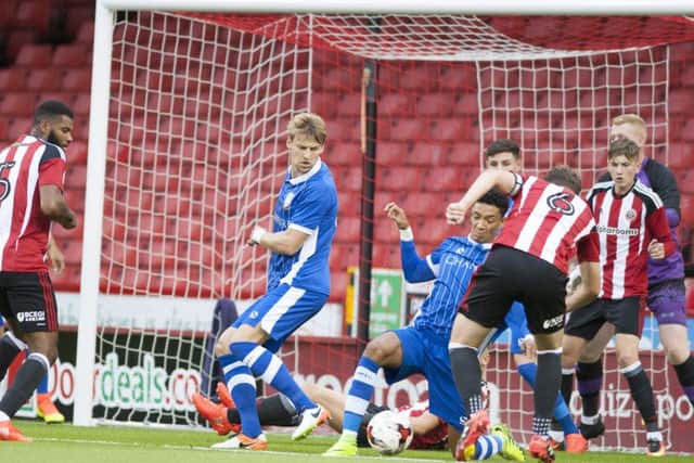 Callum Semple is denied a goal for Sheffield United