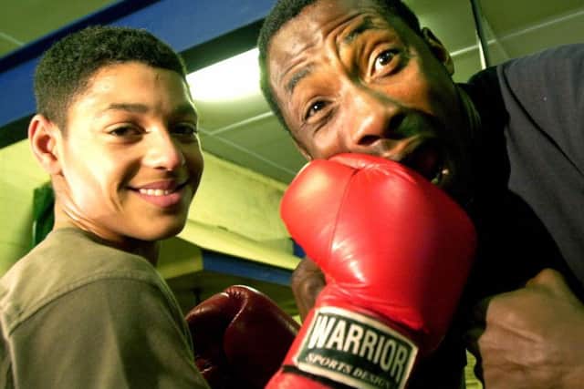 Johnny Nelson gets a whack from a 14 years old Kell Brook to clebrate the youngster becoming the Yorks and Humberside Schoolboy Champion.