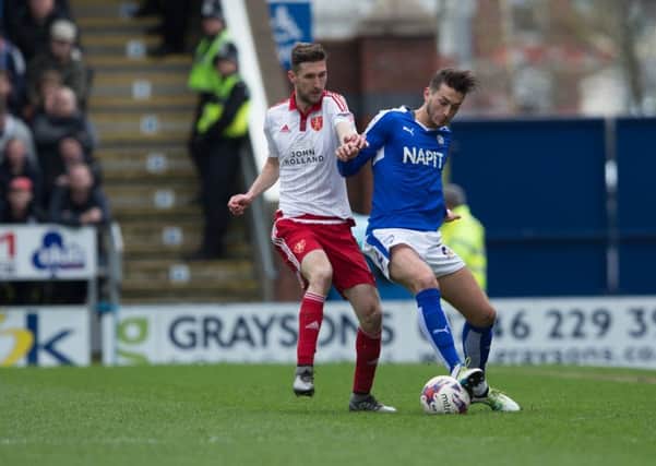 Chesterfield vs Sheffield United - Ollie Banks gets a tackle in - Pic By James Williamson